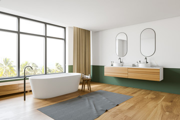 Fototapeta na wymiar White and green bathroom corner, tub and sink