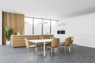 White kitchen corner, countertop and table