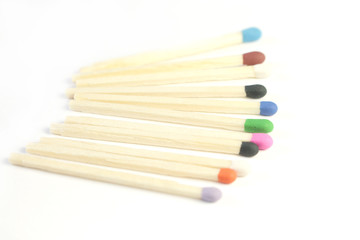 Row of colorful matches isolated on white background