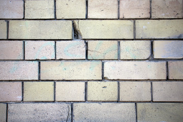 Light old building brick wall pattern design background with hole