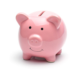 Pink piggy bank isolated on a white background