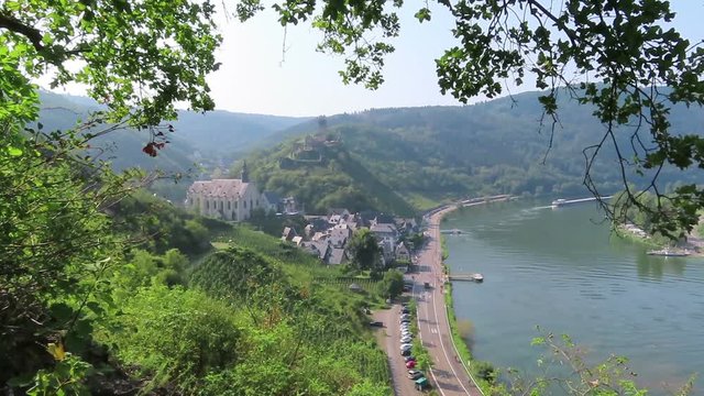 Cityscape of Beilstein at Moselle river surrounded by vineyards.