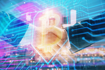 Double exposure of crypto economy theme drawing on cityscape background with handshake. Concept of partnership and blockchain