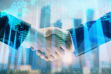 Double exposure of financial chart and world map on cityscape background with two businessmen handshake. Concept of international investment