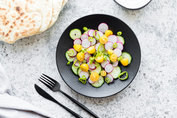 Focaccia with sauce and colorful vegetables