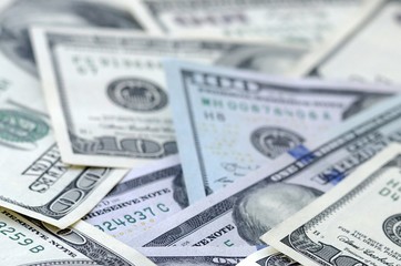 Many hundred dollar bills