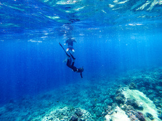 Diver in underwater and free space for your decoration. 