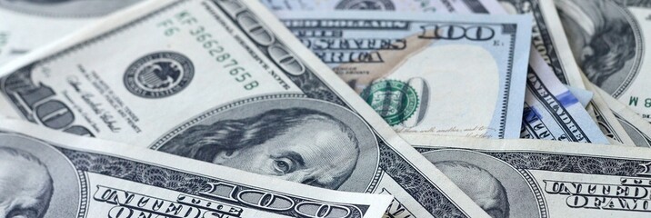 Many hundred dollar bills