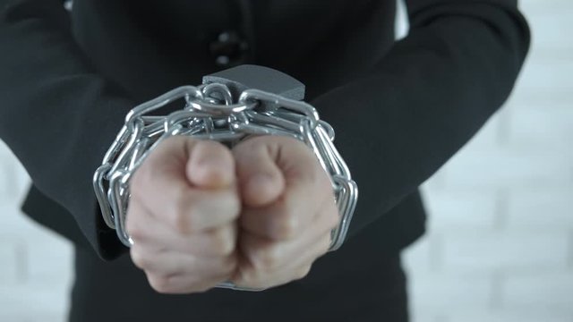 Businesswoman in chain.
