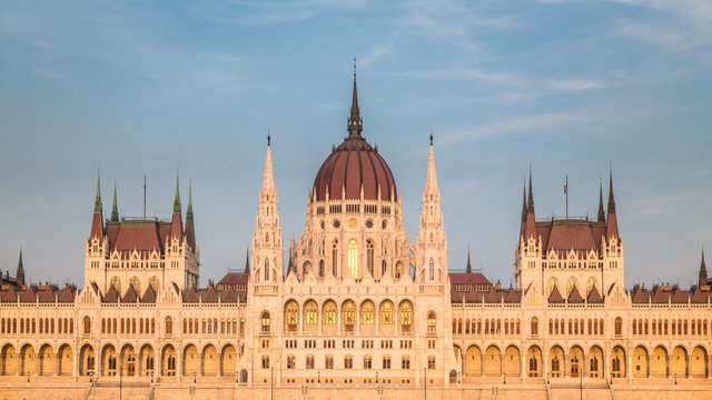 The Hungarian Parliament Building, a notable landmark of Hungary in Budapest. View of the main facade in the sunset.