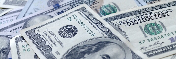 Many hundred dollar bills