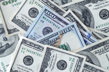 Many hundred dollar bills