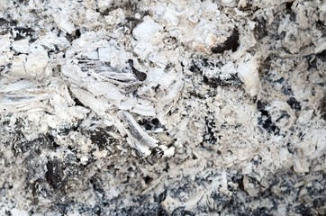 Pile of ashes after the fire went out grunge background texture