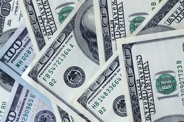 Many hundred dollar bills