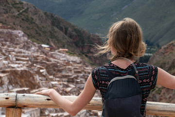 Naklejka premium Free happy blond caucasian woman enjoying outdoor vocations, slow travel and sightseeing in Peru