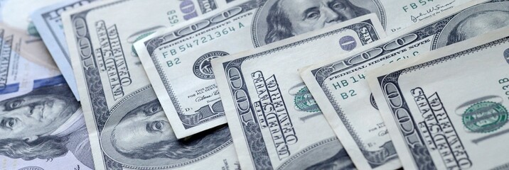 Many hundred dollar bills