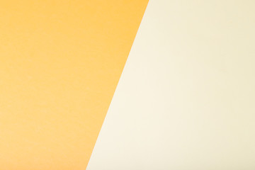 Yellow two tone color paper background.