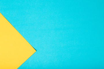 Yellow and green two tone color paper background.