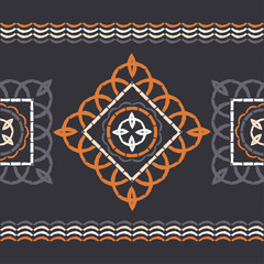 Fototapeta premium Ethnic boho seamless pattern. Lace. Embroidery on fabric. Patchwork texture. Weaving. Traditional ornament. Tribal pattern. Folk motif. Can be used for wallpaper, textile, wrapping, web. 
