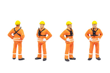 Group of Miniature figurine character as railway shunter standing and posing in posture isolated on...