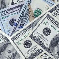 Many hundred dollar bills