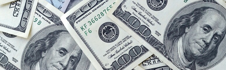 Many hundred dollar bills