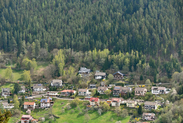 Fototapeta premium Beautiful, small and sweet German village, next to the beautiful Schwarzwald forest, aerial view