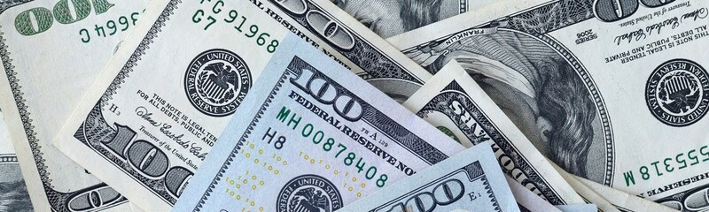 Many hundred dollar bills