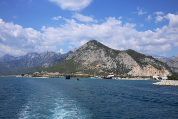 View of the high mountains, the Mediterranean Sea and the seaport of Antalya.