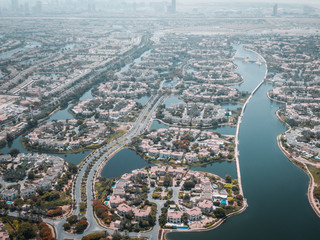 Aerial of the Jumeirah Islands in Dubai, United Arab Emirates on a very hot day