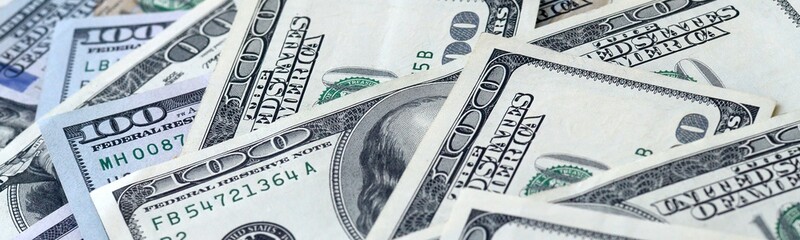 Many hundred dollar bills