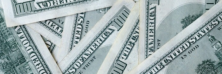 Many hundred dollar bills