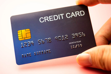 Hand holding credit card, Finance concept.