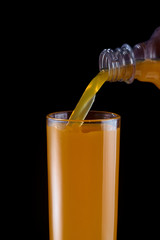 orange juice poured into a glass