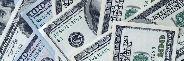 Many hundred dollar bills