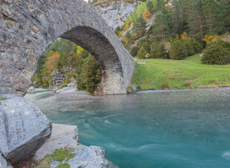 Fototapeta na wymiar Bujaruelo bridge. National Park of Ordesa and Monte Perdido. Pyrenees, Spain.