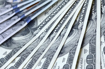 Many hundred dollar bills