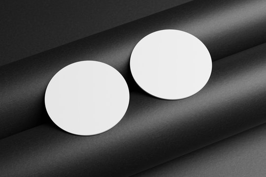 3D render Mock-up of the two round business cards are on a black paper