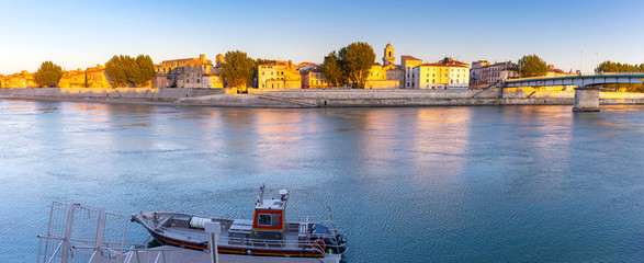 Arles. Panoramic view of the city promenade and the city at sunset.