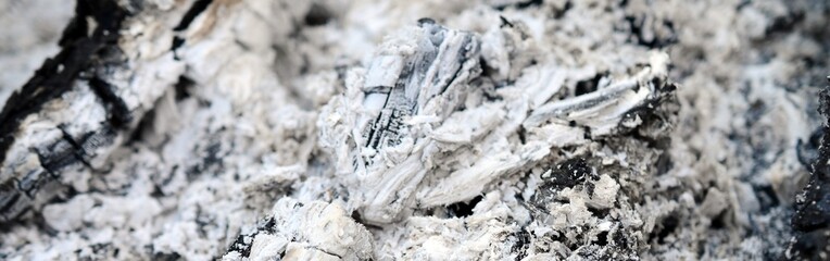 Pile of ashes after the fire went out grunge background texture