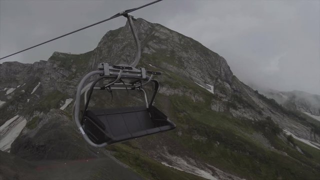 cableway in the resort of Rosa Khutor in Sochi rides in the clouds
