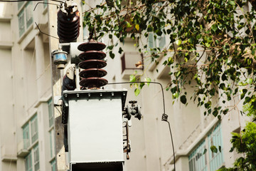 High voltage electrical insulator in an Indian Railway Station Platform. Low angel View. Close up