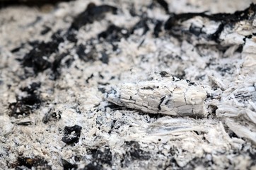 Pile of ashes after the fire went out grunge background texture