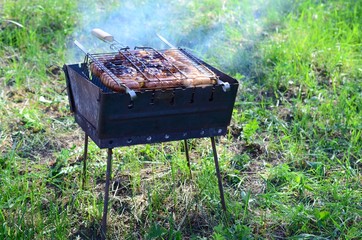 Poor and improper cooking meat on fire. Toasted meat with overcooked crust