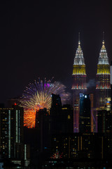Plakat The Kuala Lumpur skyline glittered with a kaleidoscope of colours and spectacular lights and sound to mark the nation’s 62 years of independence of Malaysia.