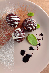 Chocolate balls with mint .