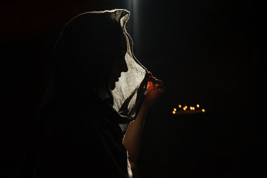 Silhouette of woman in veil