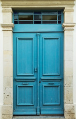 Blue front door in stone doorway