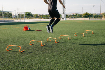 Men training on football field