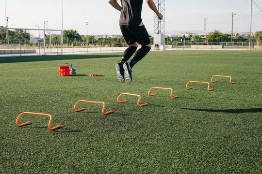 Men training on football field